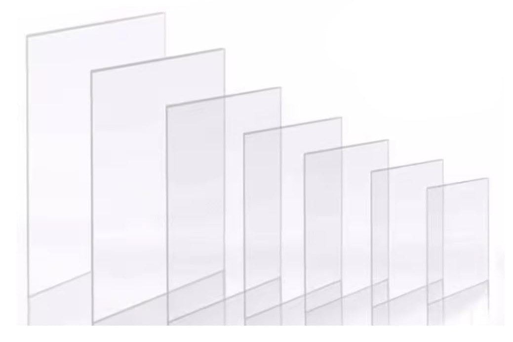 A fan of clear polycarbonate sheets in five sizes